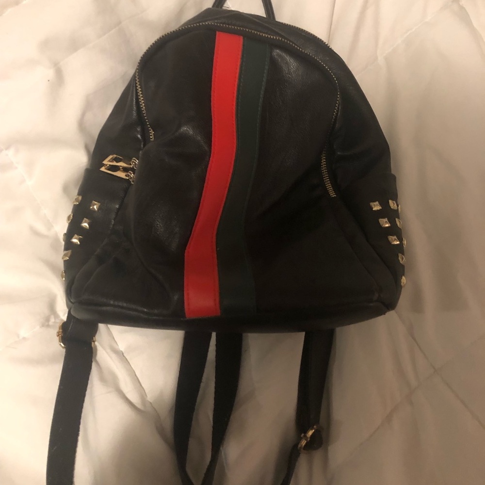 Red and Green mini backpack with gold detailing!